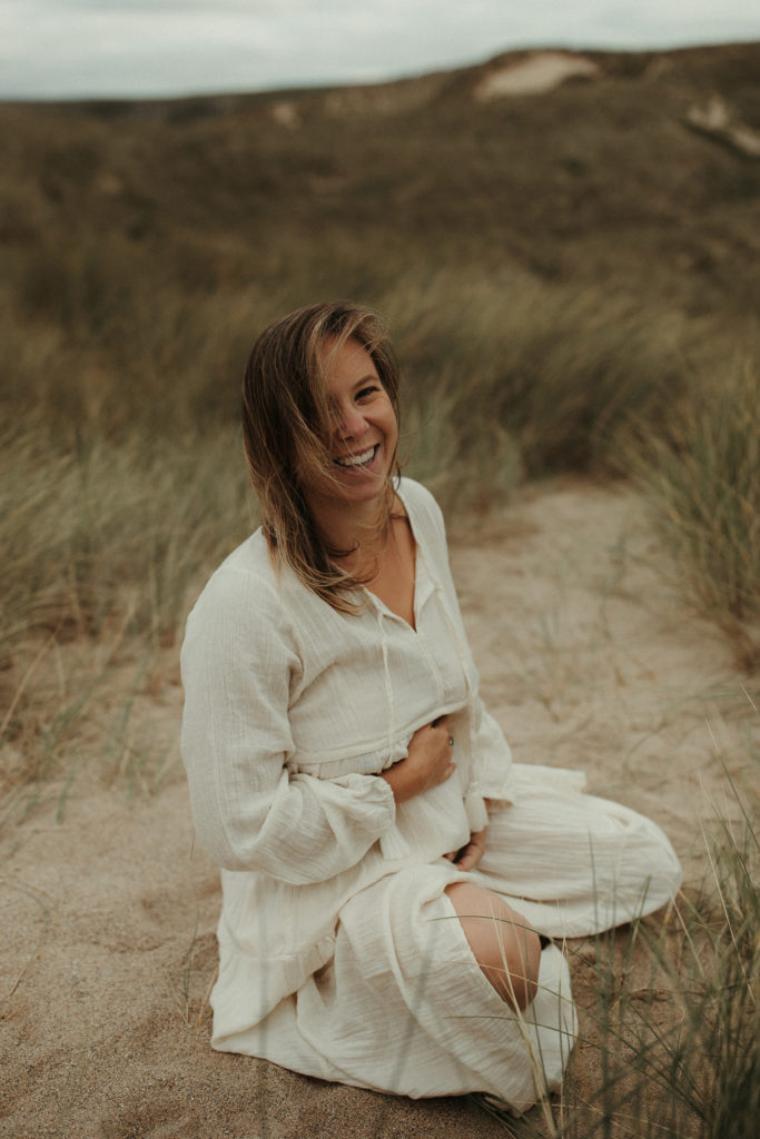 pregnant woman laughing